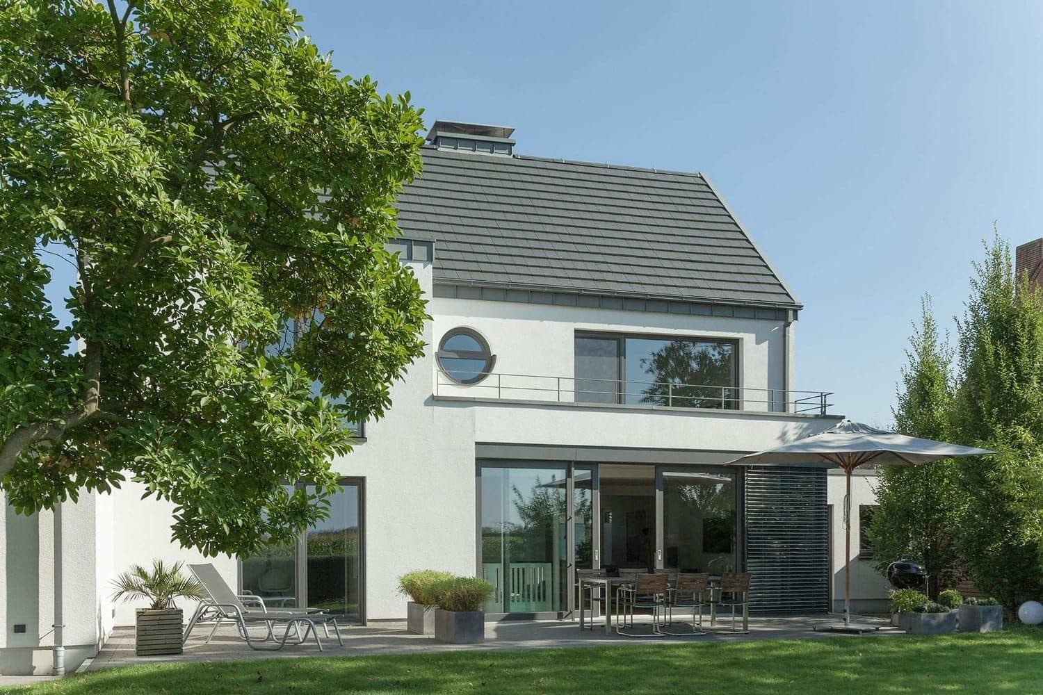 Coulissante PVC Kömmerling installée par MAK Vision à Bruxelles